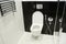 White toilet bowl with thermostatic electric towel rail for bathroom