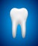 White tooth on blue background, stomatology icon