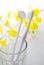 White toothbrush and yellow flower