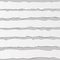 White torn blank horizontal note paper strips for text or message stuck on gray background with shadows.