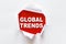 White torn paper with a word GLOBAL TRENDS