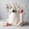 White tote bag mockup with flowers.