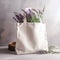 White tote bag mockup with flowers.