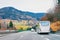 White touristic bus in road on highway