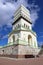 The white tower in Tsarskoe Selo near the town of Pushkin in spring on a background of white clouds