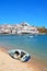 White town and beached boat, Ferragudo, Portugal.