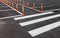 White traffic markings with a pedestrian crossing