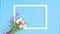 White transparent frame with tulips on blue theme. Stop motion