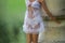 White transparent nighty on mannequin doll standing in the street