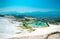 White travertine pools and terraces, turquoise lake, Pamukkale,