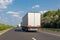 White truck on highway road. Industrial transportation concept, export, import, logistic