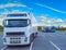 White truck parked in cloudy day