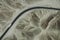 A white truck runs on the pan-American Highway through Nazca desert in Peru.