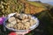 White truffles from Piedmont on the tray in the background hills