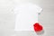 White tshirt mockup. Valentines Day concept shirt, gift box heart shape on wooden background. Copy space, template blank front