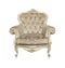 White tufted retro Chesterfield armchair isolated