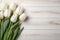 White tulips isolated on white wooden background, Ai generated