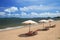 White umbrella and colorful chair is relax vacation