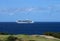 White unmarked Cruise ship near the coast