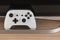 White video games controller with black background