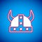 White Viking in horned helmet icon isolated on blue background. Vector