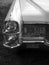 White vintage Cadillac car with headlamp chrome and radiator detail