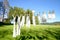 White vintage clothing hangs on clothes line in summer.