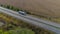 A white wagon drives along the highway in sunny weather. Truck on the highway