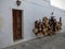 White wall with suspended objects in Andalusia in Spain.