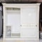White wardrobe with sliding doors, drawer and shelves, vintage style