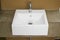 White washbasin with color earth tone