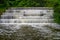 White Water flowing over weir low level view at long exposure