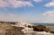 White waves smash on rocks on the beach