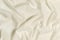 White wavy fabric texture background. Abstract linen cloth soft waves. Silk fabric. Smooth elegant luxury cloth texture