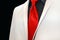 white wedding tuxedo with red tie