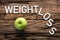 White Weight Loss Text On Wood