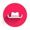 White Western cowboy hat icon isolated with long shadow. Red circle button. Vector