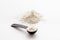 White whey protein powder in scoop. Sport nutrition concept