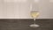 White whine in wine glass on oak table