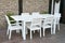 White wicker patio dining set