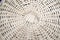 White wicker straw, circular pattern, background.