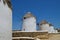 White windmills on the island of Mykonos. Greece