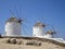 White windmills in Mykonos, Greece