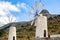 White windmills at sapiens museum in Lassithi district on Crete island, Greece