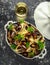 White wine and garlic steamed mussels with pasta served with parsley in white vintage tureen