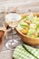 White wine glass and caesar salad