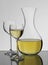 White wine glasses and carafe