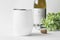 White wine tumbler mockup with cork, bottle opener, greenery and wine bottle.