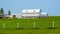 White Wisconsin Barn with Fence