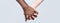 White Woman, African man Holding Hand Friendship Symbol. African Peace Symbol. Mixed race couple holding hands. Black